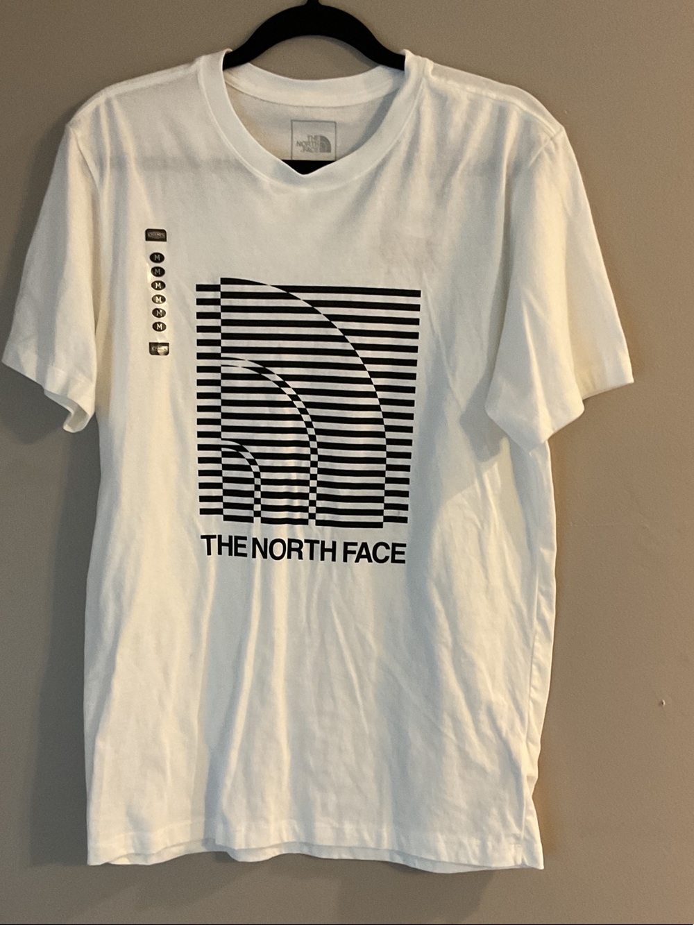 The North Face White Short-Sleeve Tee with Black Striped Logo
